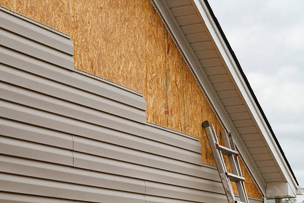Professional Emergency Siding Repair technician working in Wilmington, IL